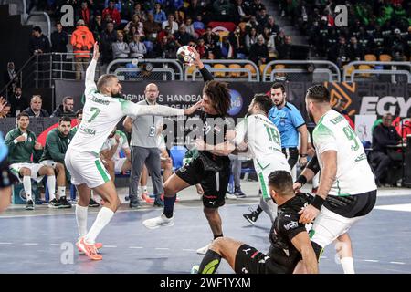 Cairo, Egypt. 27th Jan, 2024. Ali Mohamed (2nd L) of Egypt competes during the final between Egypt and Algeria at the 2024 African Men's Handball Championship in Cairo, Egypt, Jan. 27, 2024. Credit: Ahmed Gomaa/Xinhua/Alamy Live News Stock Photo