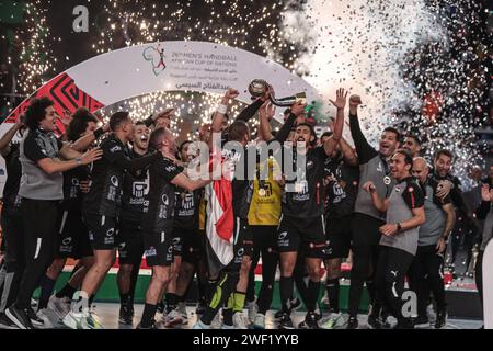 Cairo, Egypt. 27th Jan, 2024. Team Egypt celebrate after winning the final between Egypt and Algeria at the 2024 African Men's Handball Championship in Cairo, Egypt, Jan. 27, 2024. Credit: Ahmed Gomaa/Xinhua/Alamy Live News Stock Photo