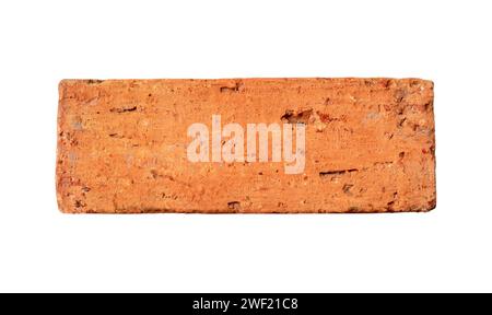 Single old cracked red or orange brick is isolated on white background with clipping path. Stock Photo