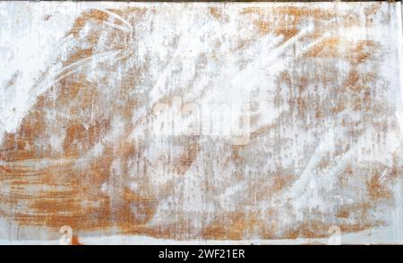 Rust dirty metal wall is used as metal background texture in decorative art work. Stock Photo