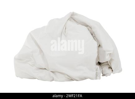 White crumpled blanket or bedclothes in hotel room leaved untidy and dirty after guest's use over night is isolated on white background with clipping Stock Photo