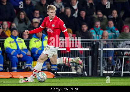 EINDHOVEN, NETHERLANDS - JANUARY 27: Jerdy Schouten (PSV Eindhoven) Controls the ball during the Eredivisie match of PSV Eindhoven and Almere City at Stock Photo
