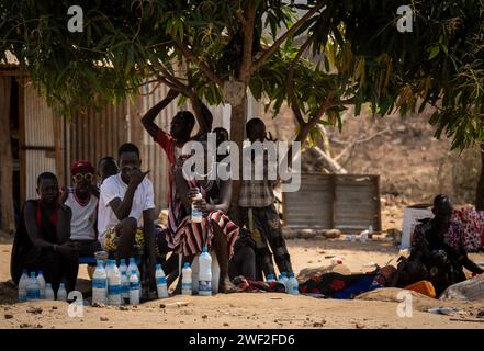 Juba, South Sudan. 26th Jan, 2024. Young men sell milk along the street in Juba. Credit: Michael Kappeler/dpa/Alamy Live News Stock Photo