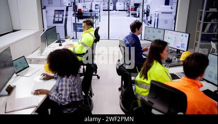 Engineer Operators Using Scada System At Industrial Plant Stock Photo