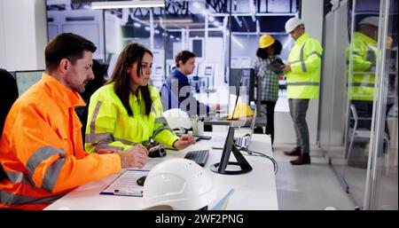 Engineer Operators Using Scada System At Industrial Plant Stock Photo