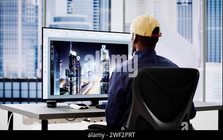 African Graphic Web Designer Using Design Editing Software Stock Photo