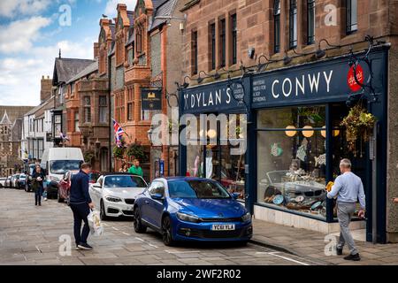 UK, Wales, Gwynedd, Conwy (Conway), town centre, High Street shops Stock Photo