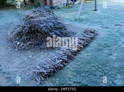 Garden waste in the garden to burn with frozen Stock Photo