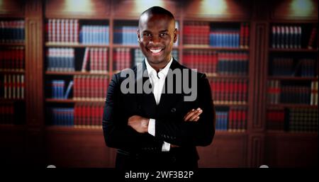 Male Attorney With Arms Crossed. Lawyer In Office Stock Photo