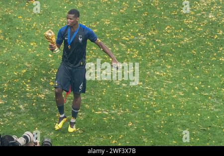 Moscow, Russia – July 15, 2018. France national football team midfielder Paul Pogba with the World Cup trophy after World Cup 2018 final match France Stock Photo