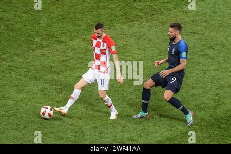 Moscow, Russia – July 15, 2018. Croatia national football team midfielder Marcelo Brozovic and France striker Olivier Giroud during World Cup 2018 fin Stock Photo