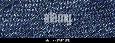 Blue jean texture. Blank denim cloth textile background. Soft fabric. Flat cotton surface. Grunge structure design. Dark navy material. Indigo vintage style. Copyspace. Horizontal banner Stock Photo