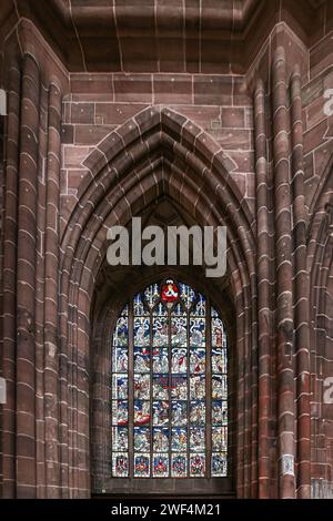 Nuremberg, Bavaria, Germany - April 30, 2023: Stained glass of St. Lorenz (St. Lawrence), a medieval Evangelical Lutheran Church built 1400-1477 in la Stock Photo