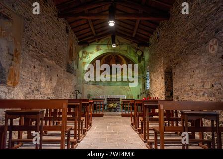 VARENNA, ITALY - OCTOBER 05, 2023 - Very old church San Giovanni Battista in Varenna, lake Como, Italy Stock Photo