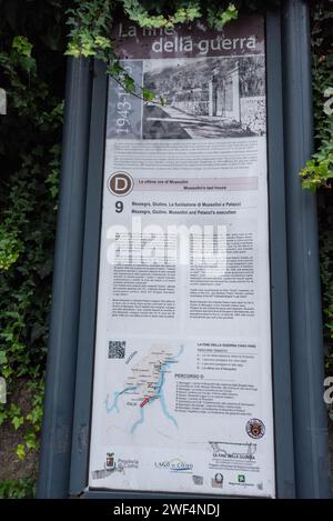 TREMEZZO, ITALY - OCTOBER 05, 2023 - Information board at the place of Mussolinis execution in Tremezzo at lake Como, Italy Stock Photo