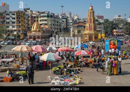 Nashik, India - January 25, 2024: People selling fruit at the Ganga Ghat in Nashik, India. Stock Photo