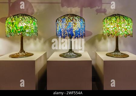 Three Tiffany table lamps with blue and green shades Three Tiffany table lamps with blue and green shades Stock Photo