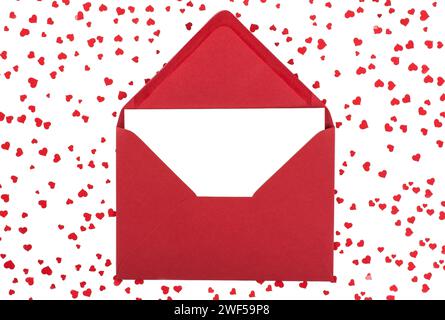 Empty white greeting card in a red envelope isolated on a white background Stock Photo