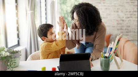 Mom, high five or child with tablet for elearning education, development growth or homework success. Family, happy mother or school kid with Stock Photo