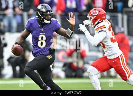 Baltimore, United States. 28th Jan, 2024. Baltimore Ravens quarterback Lamar Jackson (8) scrambles under pressure from Kansas City Chiefs cornerback L'Jarius Sneed in the second quarter during the 2024 AFC Championship Football Game at M&T Bank Stadium in Baltimore, Maryland on Sunday, January 28, 2024. Photo by David Tulis/UPI Credit: UPI/Alamy Live News Stock Photo