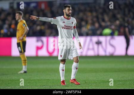Newport, UK. 28th Jan, 2024. Manchester United midfielder Bruno Fernandes (8) gestures during the Newport County AFC v Manchester United FC Emirates FA Cup 4th Round match at Rodney Parade, Newport, Wales, United Kingdom on 28 January 2024 Credit: Every Second Media/Alamy Live News Stock Photo