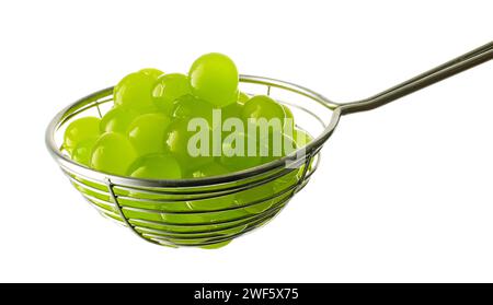 green jelly balls for making bubble tea in strainer isolated on white background Stock Photo