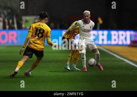 Newport, UK. 28th Jan, 2024. Antony of Manchester Utd (r) in action. Emirates FA Cup, 4th round match, Newport County v Manchester Utd at Rodney Parade in Newport, South Wales on Sunday 28th January 2024. this image may only be used for Editorial purposes. Editorial use only, pic by Andrew Orchard/Andrew Orchard sports photography/Alamy Live news Credit: Andrew Orchard sports photography/Alamy Live News Stock Photo