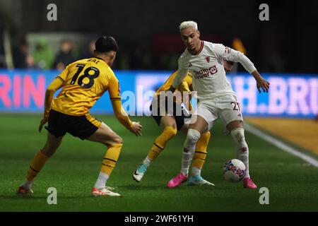 Newport, UK. 28th Jan, 2024. Antony of Manchester Utd (r) in action. Emirates FA Cup, 4th round match, Newport County v Manchester Utd at Rodney Parade in Newport, South Wales on Sunday 28th January 2024. this image may only be used for Editorial purposes. Editorial use only, pic by Andrew Orchard/Andrew Orchard sports photography/Alamy Live news Credit: Andrew Orchard sports photography/Alamy Live News Stock Photo