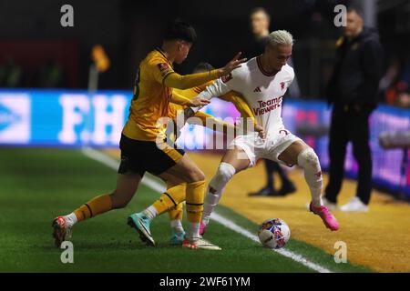 Newport, UK. 28th Jan, 2024. Antony of Manchester Utd (r) in action. Emirates FA Cup, 4th round match, Newport County v Manchester Utd at Rodney Parade in Newport, South Wales on Sunday 28th January 2024. this image may only be used for Editorial purposes. Editorial use only, pic by Andrew Orchard/Andrew Orchard sports photography/Alamy Live news Credit: Andrew Orchard sports photography/Alamy Live News Stock Photo