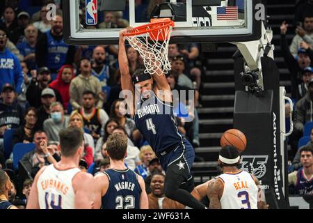 Orlando, Florida, USA, January 28, 2024, Orlando Magic guard Jalen Suggs #4 makes a dunk in the first half at the Kia Center. (Photo Credit: Marty Jean-Louis/Alamy Live News Stock Photo