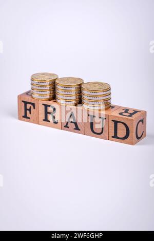 The inscription Fraud inspection made of wooden cubes on a plain ...