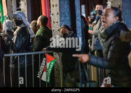 New York, New York, USA. 27th Jan, 2024. Pro-Palestine protesters chant and march outside the JFK AirTrain at Jamaica Station, during the National Day of Action in Queens, New York on Saturday, January 27, 2024. The group attempted to board the shuttle to JFK Terminals but was turned back by the NYPD, who have recently become more aggressive in shutting down the pro-Palestinian actions. (Credit Image: © Michael Nigro/Pacific Press via ZUMA Press Wire) EDITORIAL USAGE ONLY! Not for Commercial USAGE! Stock Photo