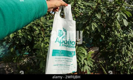 Apollo Pharmacy home delivery bag. Biodegradable Eco Friendly Plastic bag.Compostable thin polythene bag Stock Photo