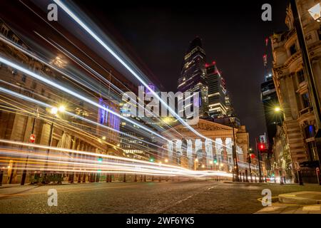 London. UK-01.27.2024. A night time , long exposure view of the City of London showing the Royal Exchange, Bank of England and skyscrapers in the back Stock Photo