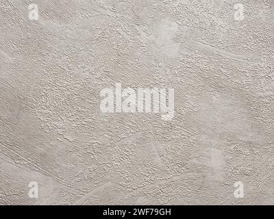 Abstract textured gray white stucco wall background or backdrop. Seamless material wallpaper with rough vintage, weathered and grunge outlook. Design Stock Photo