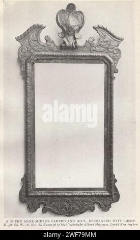 The furniture collector : old english furniture of the XVII. & XVIII. centuries. published by the Herbert Jenkins book An introduction to the study of English styles of the seventeenth and eighteenth centuries by Edward W. Gregory with 55 illustrations of typical pieces of furniture from public and private collections. A Queen Anne mirror carved and gilt, decorated with Gesso H. 3ft. 2in. W. 1ft. 8in.  in room 56 of the Victoria and Albert Museum, South Kensington / Queen Anne style furniture Stock Photo