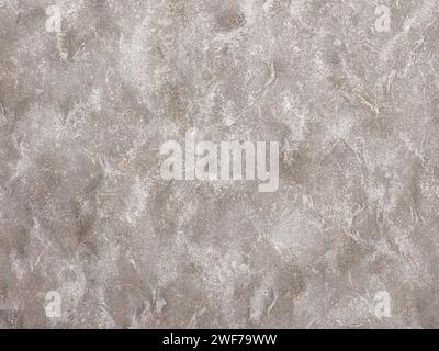 Abstract textured grunge beige gray stucco wall background or backdrop. Wallpaper with rough vintage, weathered and grunge outlook. Copy space for des Stock Photo
