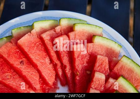 Close-up of watermelon sliced on plate Stock Photo