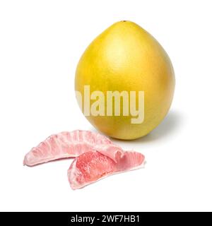Whole fresh red Pomelo and peeled pomelo slices close up isolated on white background Stock Photo