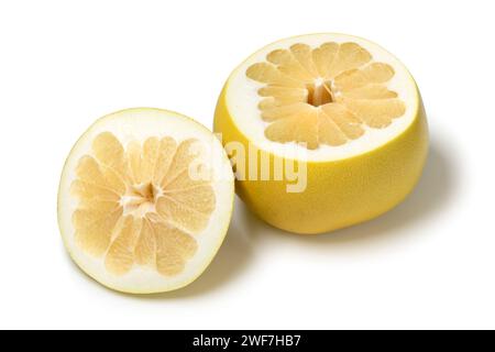 Halved white honey sweet fresh  Pummelo on isolated on white background close up Stock Photo