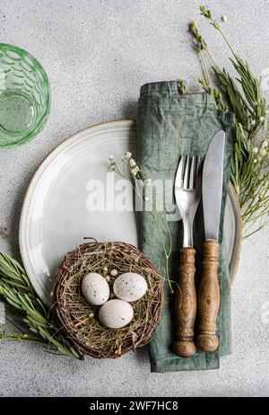 easter table setting with nest Stock Photo