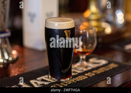 Pint glass of Guiness Stock Photo