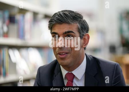 Prime Minister Rishi Sunak with his parents Yashvir and Usha Sunak, at ...