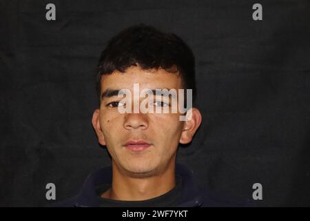 Picture of himalayan adult man with a black backround Stock Photo