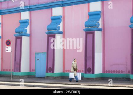 Copenhagen, Denmark. January 29th, 2023. A woman walks past the Palads Cinema as Copenhagen Fashion Week begins in the city today. Credit: Katie Collins/EMPICS/Alamy Live News Stock Photo