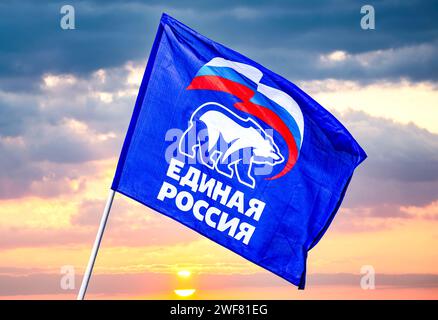 Samara, Russia - May 1, 2019: Flag of the party United Russia against the sunset sky Stock Photo