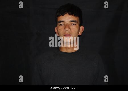 Picture of himalayan adult man with a black backround Stock Photo