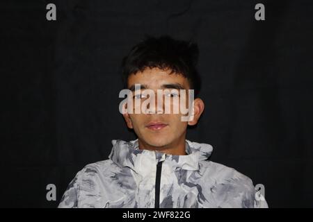 Picture of himalayan adult man with a black backround Stock Photo