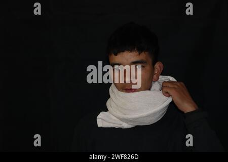 Picture of himalayan adult man with a black backround Stock Photo