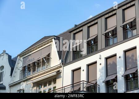 gray sunshades on the windows of Hamburg city villas Stock Photo